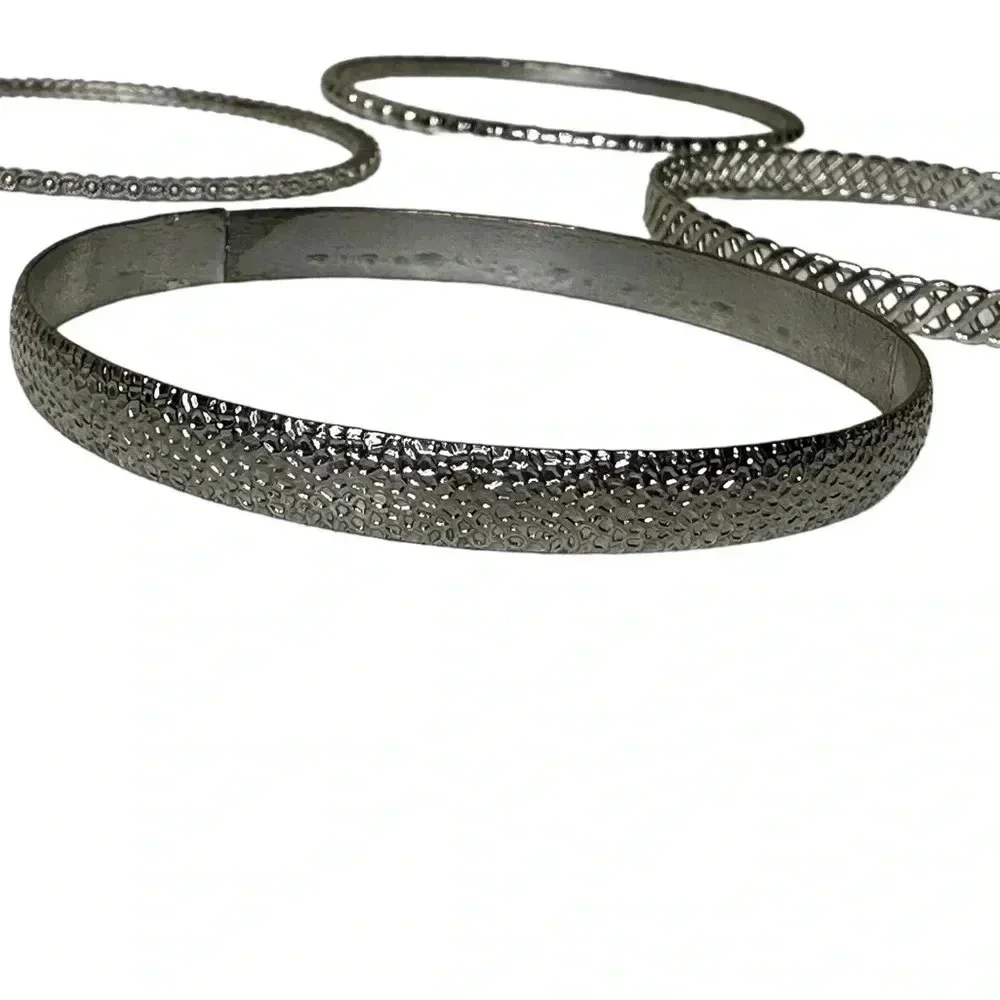Set of 4 silver bangle bracelets